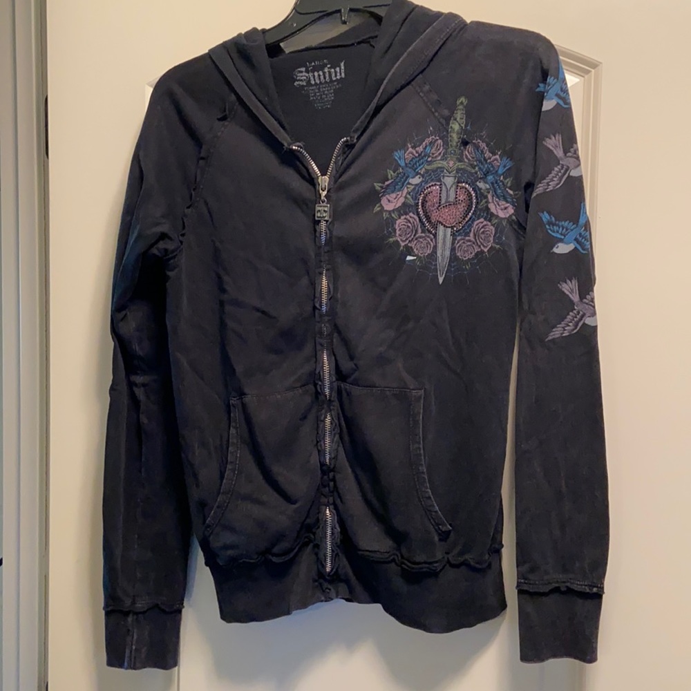 Color is black distressed. Zip up with hood